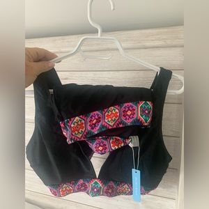 Beautiful swimsuit , super soft material , size Xl, such nice colours.